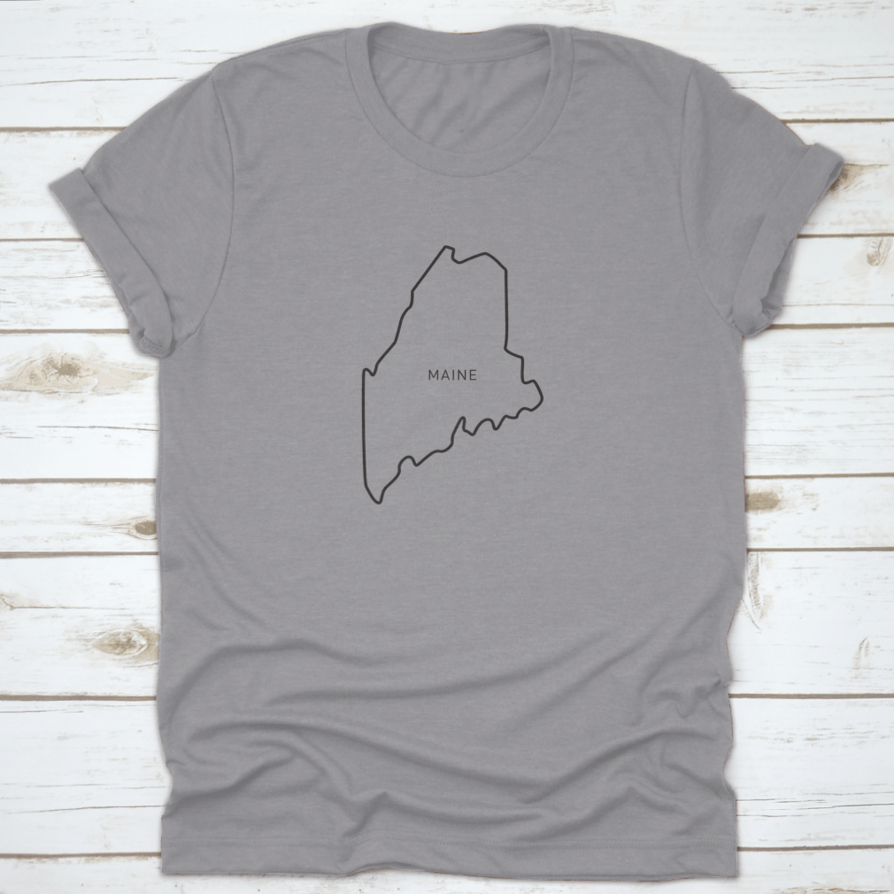 A stylish t-shirt featuring a simple typography outline of the state of Maine, made from high-quality cotton fabric.